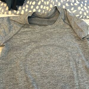 Gently used Lululemon short sleeve gray athletic shirt